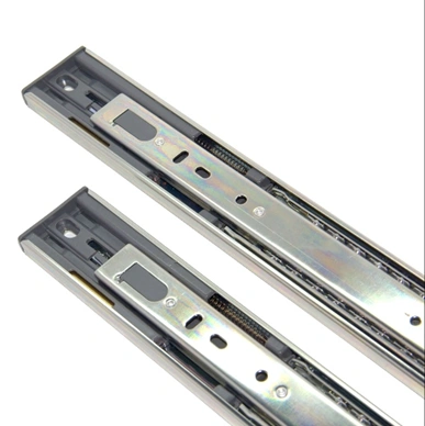Soft close telescopic channel drawer slide with integrated damping mechanism