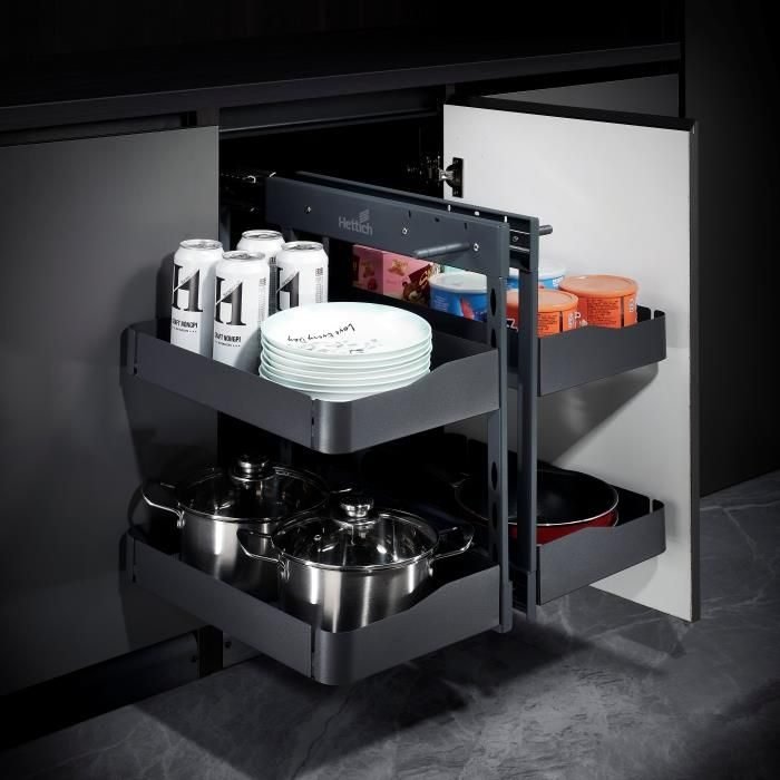 Hettich corner pull-out in a kitchen cabinet holding plates and pots
