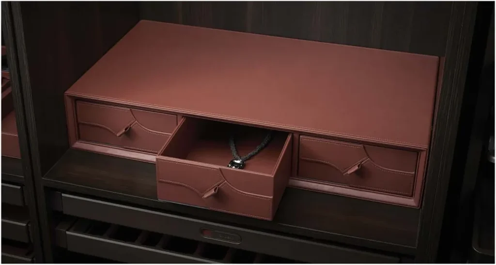 Leather triple-layer drawer organiser inside a wardrobe