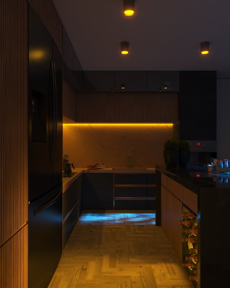 Kitchen counter lit by warm LED lights under the wall cabinets